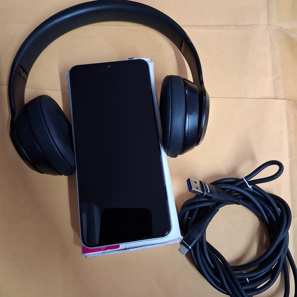 Tmobile REVVL7 Smartphone with Beats Wireless Headphones and Long USB Cable